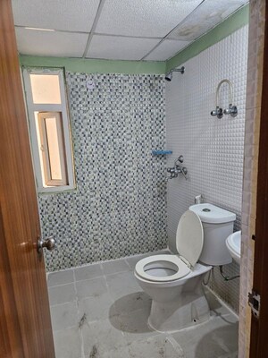 Bathroom in 3 BHK Apartment at Spring Meadows, Tech Zone 4 Greater Noida – for Rent