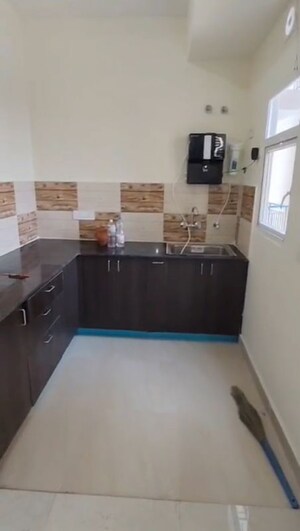 Kitchen in 3 BHK Apartment at Amrapali Enchante, Tech Zone 4 Greater Noida – for Sale
