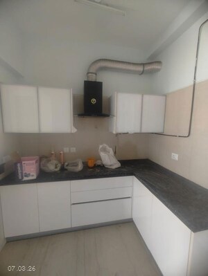 Kitchen in 3.5 BHK Apartment at Microtek Greenburg, Sector 86 – for Rent
