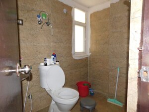 Bathroom in 4 BHK Apartment at Spring Meadows, Tech Zone 4 Greater Noida – for Rent