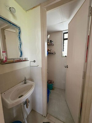 Bathroom in 1 RK Apartment at Lodha Palava Crown, Dombivli East – for Rent