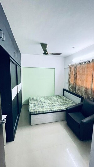 Bedroom in 2 BHK Apartment at Gini Bellina, Lohgaon – for Rent