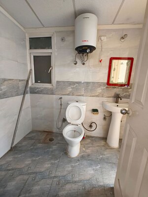 Bathroom in 3 BHK Apartment at Assotech Windsor Park, Vaibhav Khand – for Rent