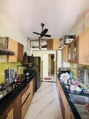 Kitchen in 2 BHK Apartment at Mulund West – for Rent
