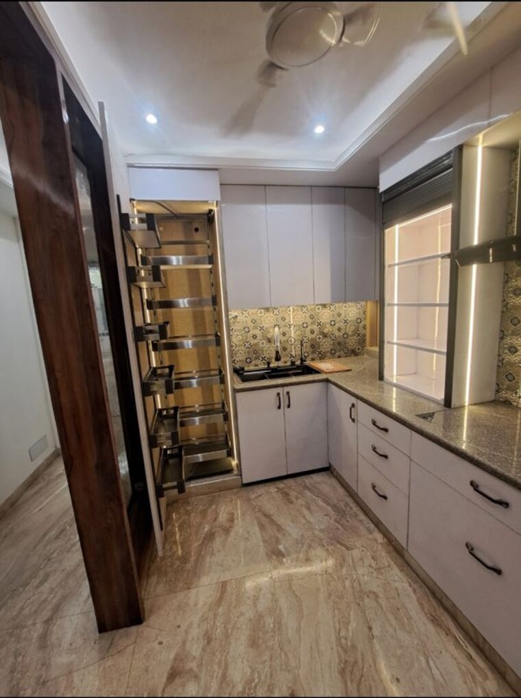 Kitchen, chittaranjan park 4 Bedroom 1400 Sq.Ft. Builder Floor In Chittaranjan Park Delhi 10317867