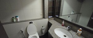Bathroom in Studio Apartment at Assotech Windsor Park, Vaibhav Khand – for Rent