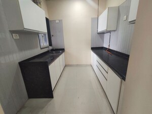 Building Lobby in 2 BHK Apartment at Omkar Signet, Malad East – for Rent