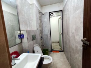 Bathroom in 2 BHK Apartment at Omkar Signet, Malad East – for Rent
