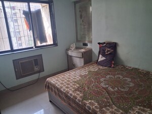 Bedroom in 2 BHK Apartment at Kalpana CHS Tilak Nagar, Tilak Nagar – for Rent