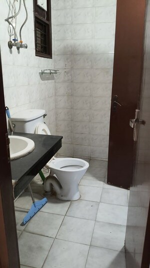 Bathroom in 4 BHK Apartment at Emaar Palm Terraces Select, Sector 66 – for Sale