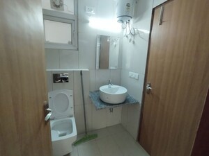 Bathroom in 2 BHK Apartment at SS The Leaf, Sector 85 – for Sale