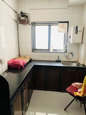 Kitchen in 2 BHK Apartment at Kasturbam Apartments, Goregaon East – for Rent
