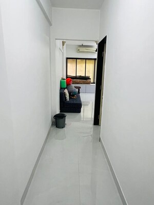 Building Lobby in 2 BHK Apartment at Kasturbam Apartments, Goregaon East – for Rent