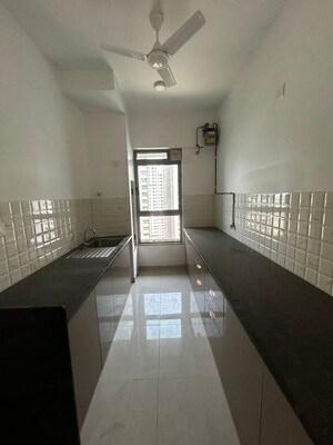 Kitchen in 1 RK Apartment at VR Bhoomi Acres G Wing, Ghodbunder Road – for Sale