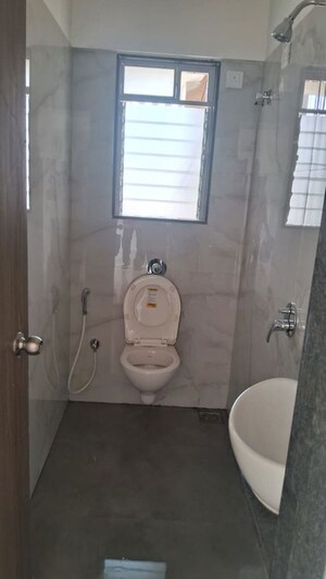 Bathroom in 1 BHK Apartment at Paradigm Zenith Pushpanjali Residency Phase III, Ghodbunder Road – for Rent
