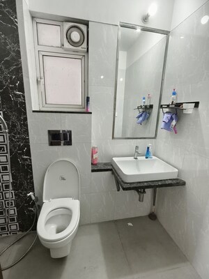 Bathroom in 2 BHK Apartment at Omkar Ananta, Goregaon East – for Rent