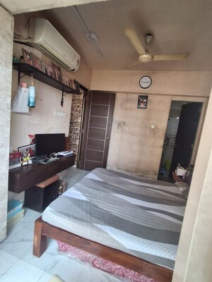 Master Bedroom in 1.5 BHK Apartment at Borivali East – for Sale