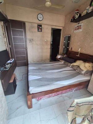 Master Bedroom in 1.5 BHK Apartment at Borivali East – for Sale