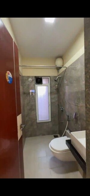 Bathroom in 2 BHK Apartment at Dhoot Sky Residency New Sonali CHSL, Malad West – for Rent
