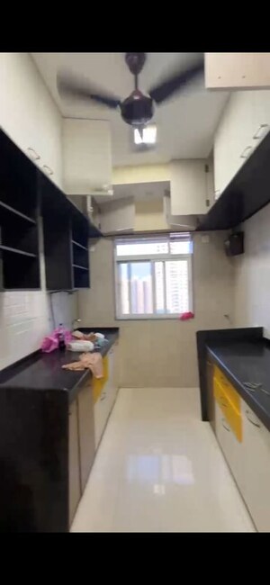 Kitchen in 2 BHK Apartment at Dhoot Sky Residency New Sonali CHSL, Malad West – for Rent