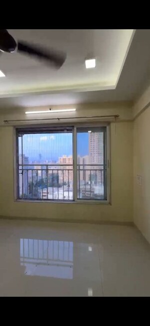 Room in 2 BHK Apartment at Dhoot Sky Residency New Sonali CHSL, Malad West – for Rent