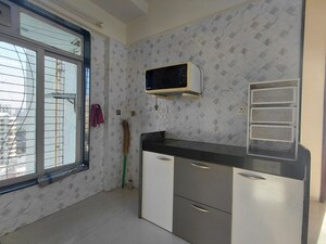 Kitchen in 2 BHK Apartment at Ahimsa Heights, Malad West – for Rent