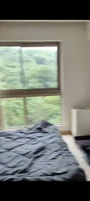 Bedroom in 2 BHK Apartment at Castle Rock, Powai – for Rent