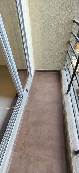 Building Lobby in 1 BHK Apartment at Patel Meadows, Joveli – for Sale