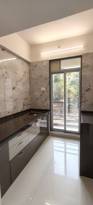 Kitchen in 1 BHK Apartment at Patel Meadows, Joveli – for Sale