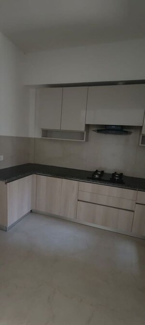 Kitchen in 3.5 BHK Builder Floor at Smart World Orchard, Sector 61 – for Rent
