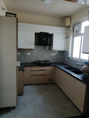 Kitchen in 3 BHK Builder Floor at Ansal API Esencia, Sector 67 – for Rent