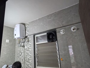 Bathroom in 2 BHK Apartment at Rohan Prarthana, Kothrud – for Rent