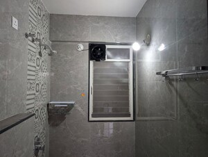 Bathroom in 2 BHK Apartment at Rohan Prarthana, Kothrud – for Rent