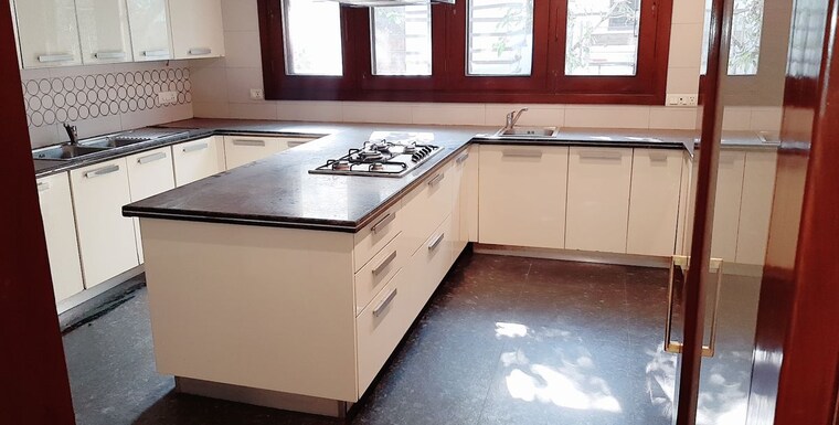 Kitchen, panchsheel park 5 Bedroom 800 Sq.Yd. Builder Floor In Panchsheel Park Delhi 10318677