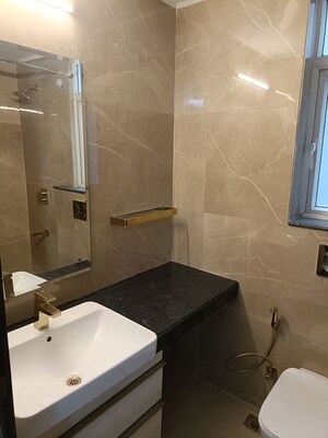 Bathroom in 3 BHK Apartment at Smart World Orchard, Sector 61 – for Sale