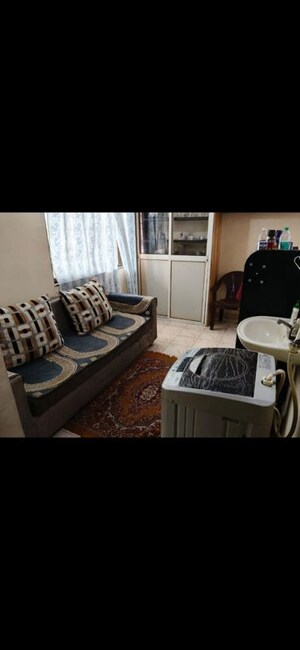 Living Room in 1 BHK Apartment at Anand Park, Wadgaon Sheri – for Rent