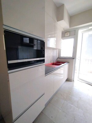 Kitchen in 4 BHK Apartment at DLF Regal Gardens, Sector 90 – for Sale