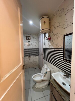 Bathroom in  Builder Floor at DLF Belvedere Towers, Sector 24 – for Rent
