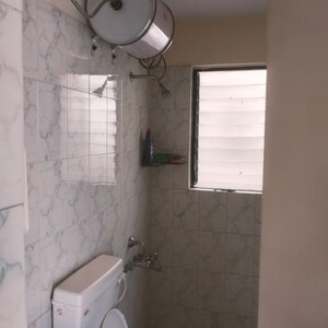 Bathroom in 3 BHK Apartment at Kolte Patil Green Acre, Salunkhe Vihar Society – for Rent