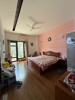 Bedroom in 3 BHK Builder Floor at Nehru Enclave – for Rent