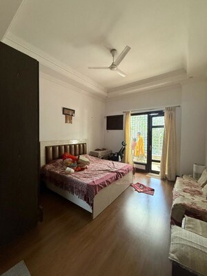 Bedroom in 3 BHK Builder Floor at Nehru Enclave – for Rent