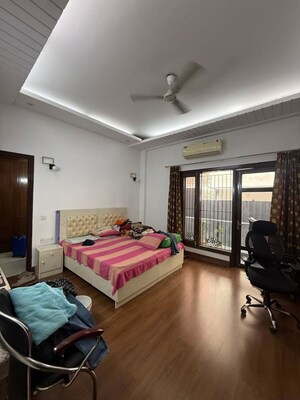 Bedroom in 3 BHK Builder Floor at Nehru Enclave – for Rent