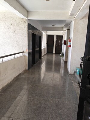 Building Lobby in 2.5 BHK Apartment at Antriksh Golf View, Sector 78 – for Rent