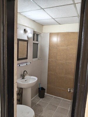 Bathroom in 2.5 BHK Apartment at Antriksh Golf View, Sector 78 – for Rent