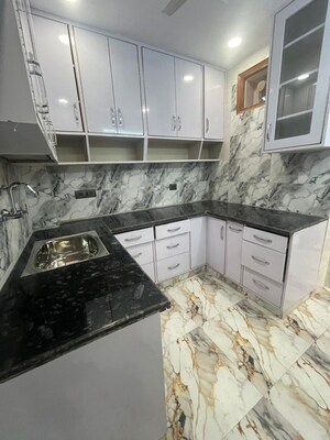 Kitchen in 2 BHK Builder Floor at Freedom Fighters Enclave – for Rent