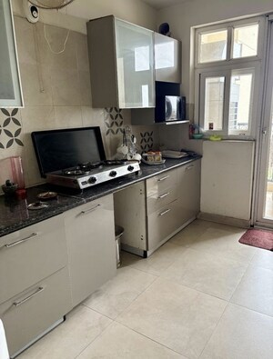 Kitchen in 3.5 BHK Apartment at ATS Triumph, Sector 104 – for Rent