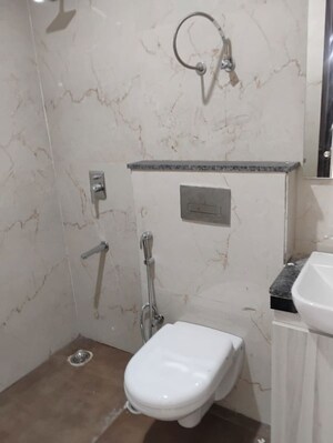 Bathroom in 2.5 BHK Builder Floor at Smart World Gems, Sector 89 – for Rent