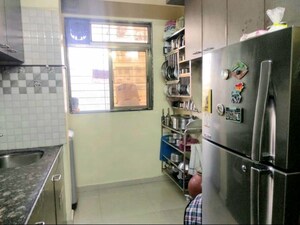 Furnished Amenities in 2 BHK Apartment at Asha Nagar CHS, Mulund West – for Rent