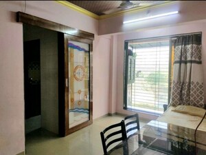 Bedroom in 2 BHK Apartment at Asha Nagar CHS, Mulund West – for Rent