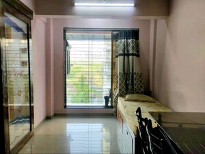 Kitchen in 2 BHK Apartment at Asha Nagar CHS, Mulund West – for Rent